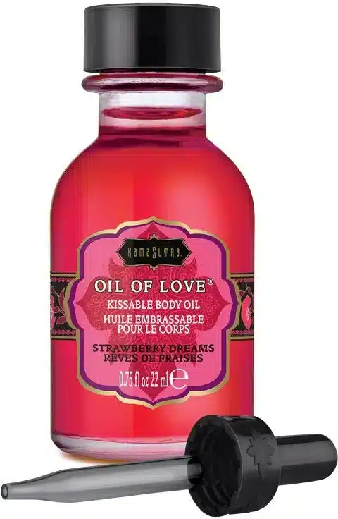red oil in a glass jar with a black dropper lid in the scent strawberry dreams
