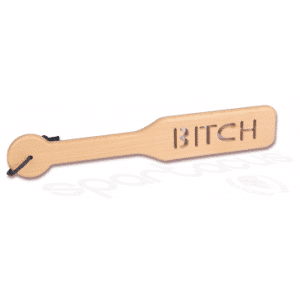 wooden paddle with bitch carved into it